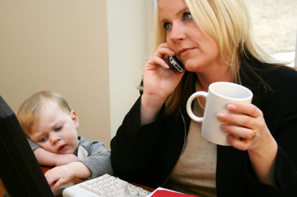Toddler with mom on phone
