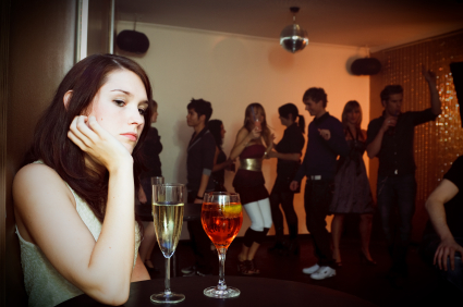 Young woman alone at club